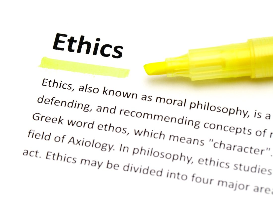 A yellow marker with the word ethics on it.